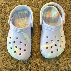 Gently used girls marble blue and purple Crocs